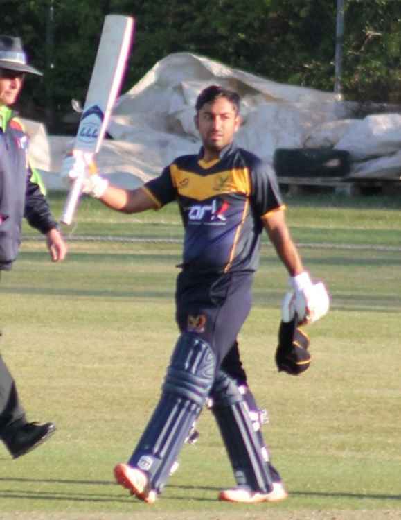 Zaryab celebrates his century (Image: Steve Johnson)