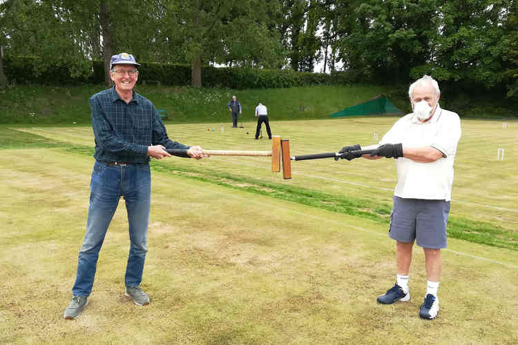 Club members Philip Wood (left) and Cliff Daniel enjoying the post-lockdown return to the lawns
