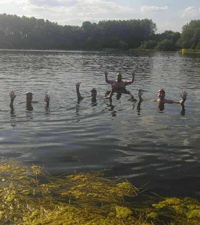 The team at the Midlands open water swimming centre where they completed their two-hour cold water qualifier