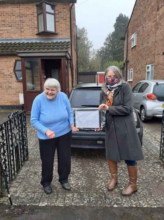 Margaret was presented with a sketch by talented artist Diane Shores showing her fundraising, something for which she is famous for in the town