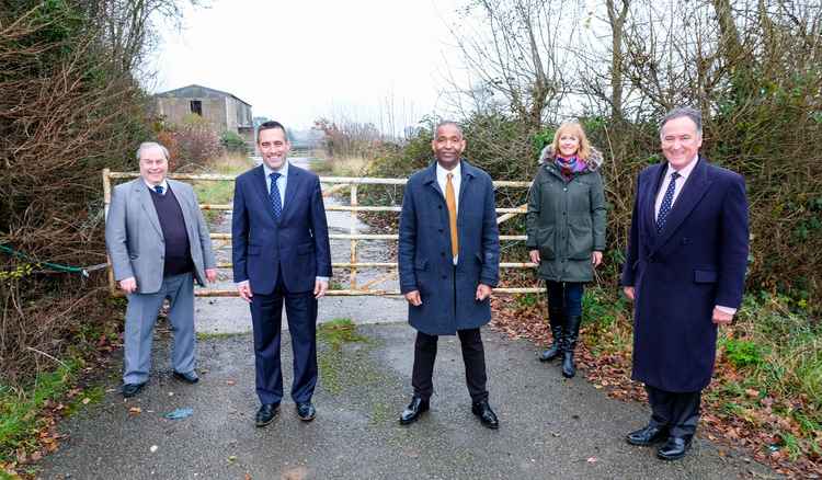 Outside the entrance at the new Kenilworth School and Sixth Form site (l to r) Cllr John Cooke, Richard Hales (KMAT Trustee), Hayden Abbott (Executive Headteacher), Shirley Whiting (KMAT Trustee) and Warwick District Council Leader Andrew Day