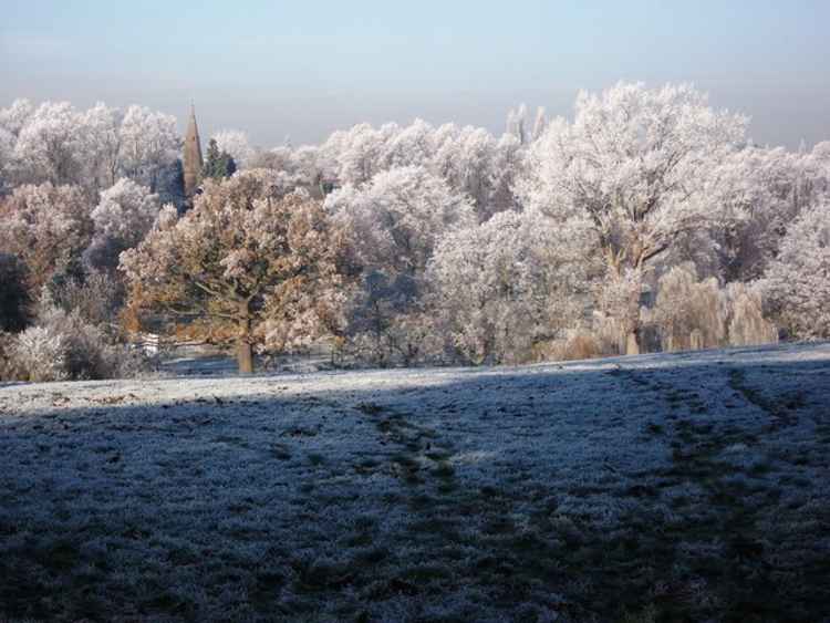 'A frost-covered view towards the St Nicholas church' by John Brightley