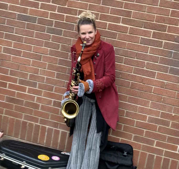 The couple were able to enjoy a saxophonist as photos were taken at Abbey Fields