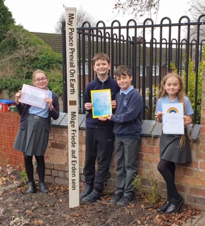 Pupils at the Peace Pole planting at Westgate School in Warwick in December