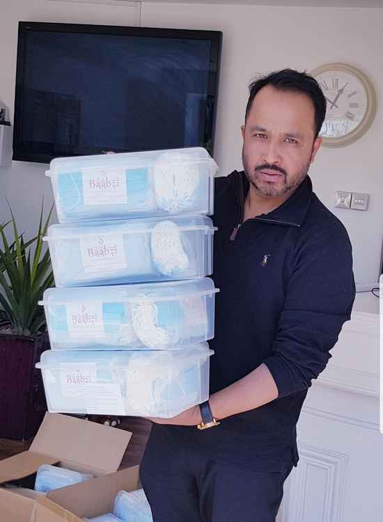 Baabzi delivered 2,000 masks to Warwick Hospital last May