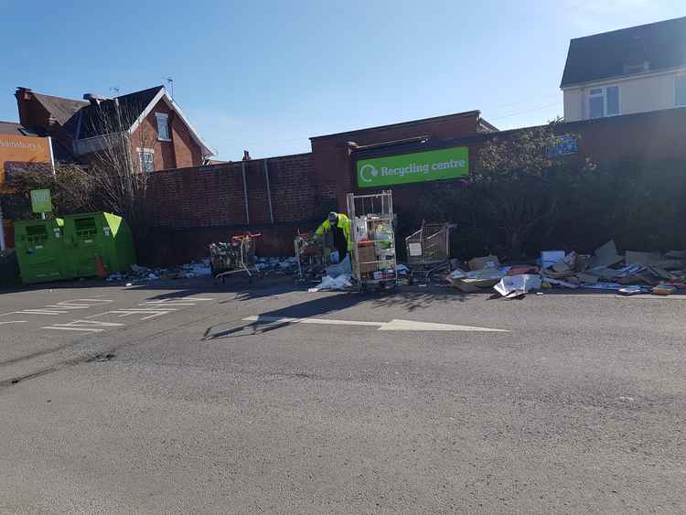 Sainsbury's recycling banks being cleaned Tuesday March 9 (Clive Peacock)