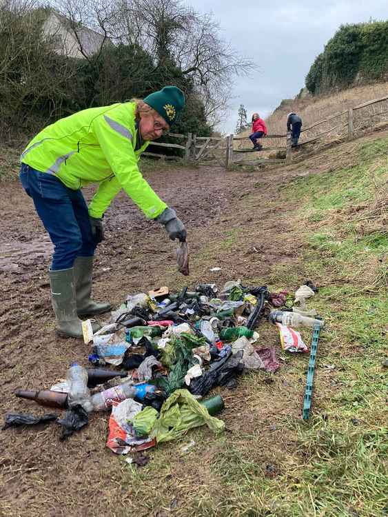 John Dearing collecting litter near Kenilworth Castle