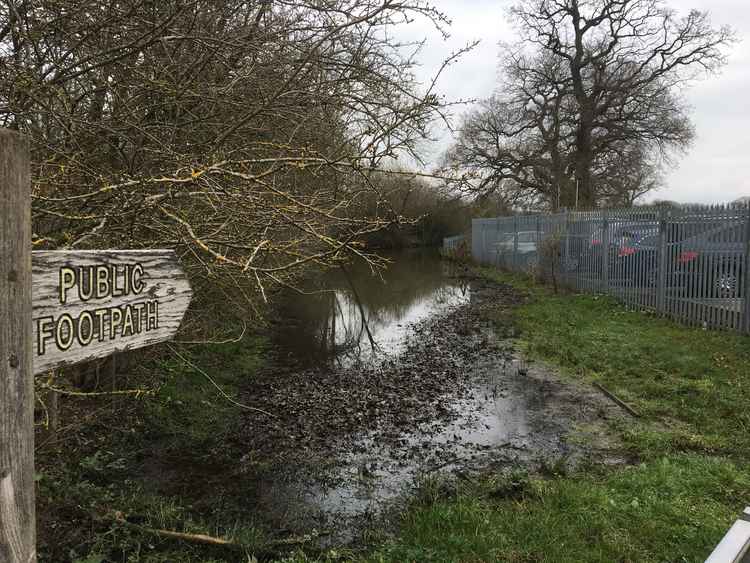 Flooded footpath opposite the Railway Inn