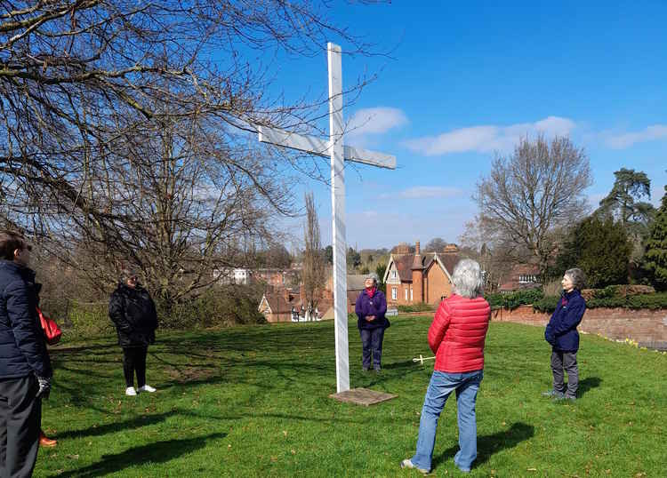 A socially-distanced and small raising of the cross was possible this year