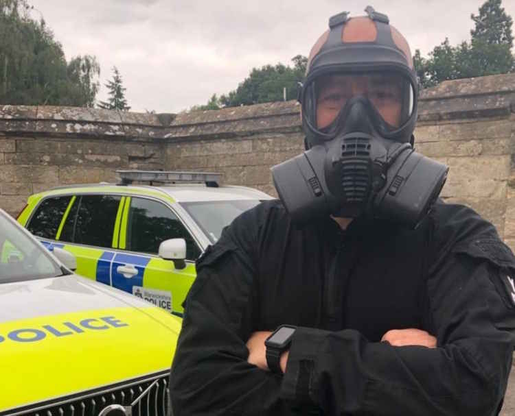 PC Scott Caswell will walk four miles every day this July whilst wearing a full face respirator and carrying a 50lb military bergan