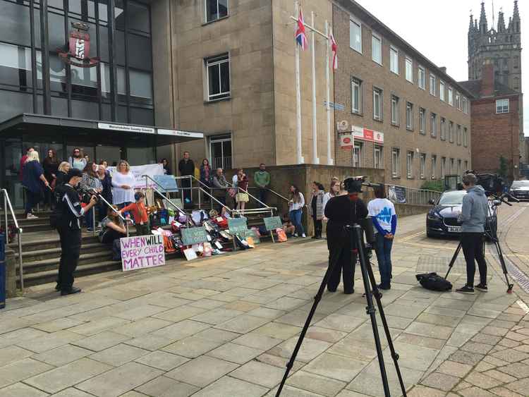 Film crews from ITV news were in attendance to speak to parents (Image via SEND Crisis Warwickshire)