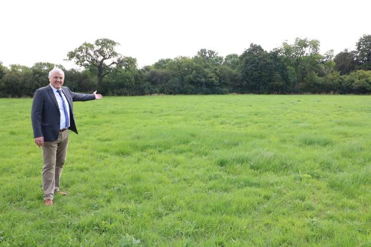 Cllr Jan Matecki surveys the development site in Kenilworth