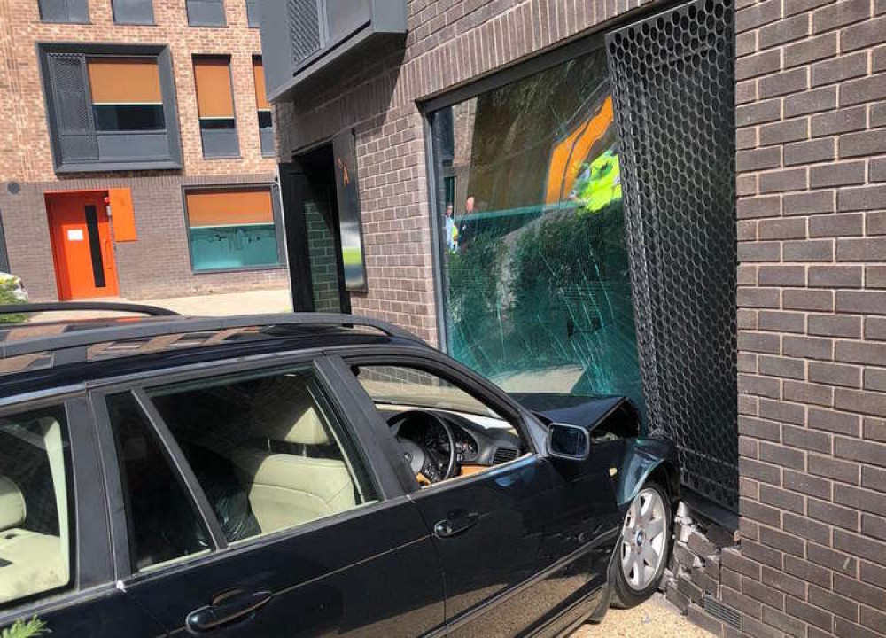 The car crashed into the building on Saturday (Image via Warwickshire Police)