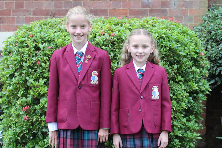 Issey Cleary (left) and Elora Hughes (right) will compete in the ISA National Swimming Championships this November