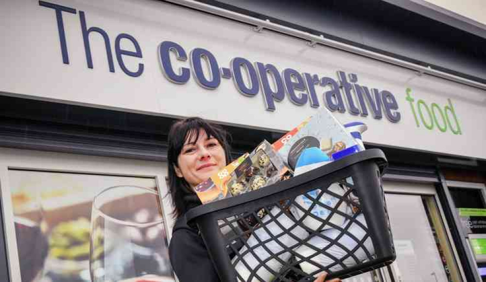 Central England Co-op store manager Amanda Faulkner with one of the treat packages sent out to care homes