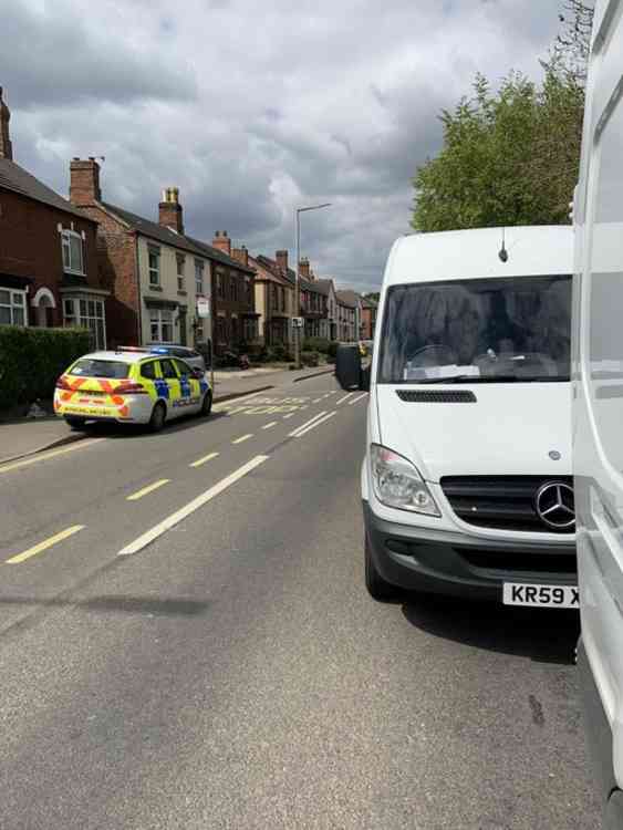 Police at the scene of the crime in Swadlincote