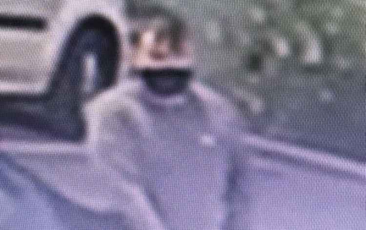 One of the suspects was captured on CCTV before the theft. Photo: Derbyshire Constabulary