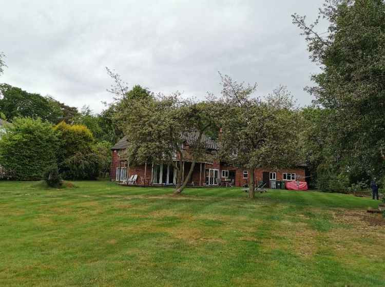 Rear of 36 Dunnocksfold Road, looking north.