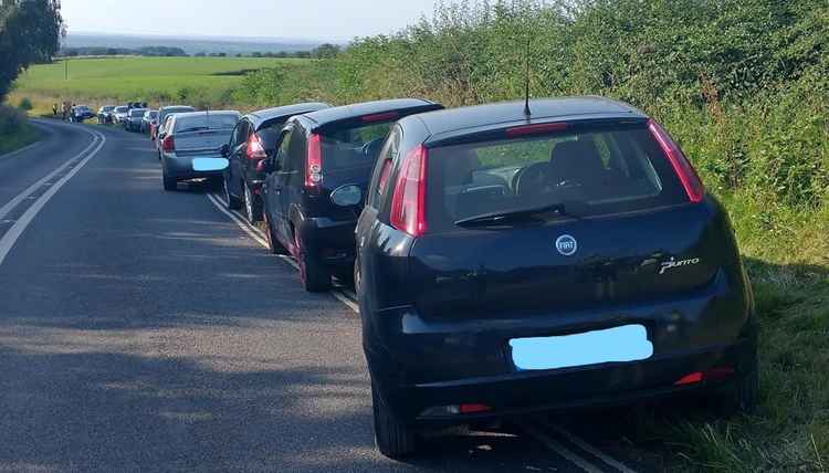 Drivers parked illegally on the grass verges outside Foremark Reservoir. Photos: Swadlincote SNT