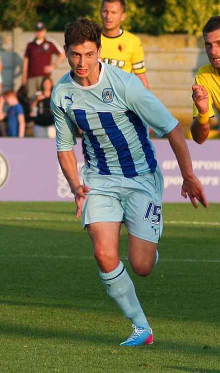 Miller playing for Coventry City in 2014. (Image by Wikipedia)