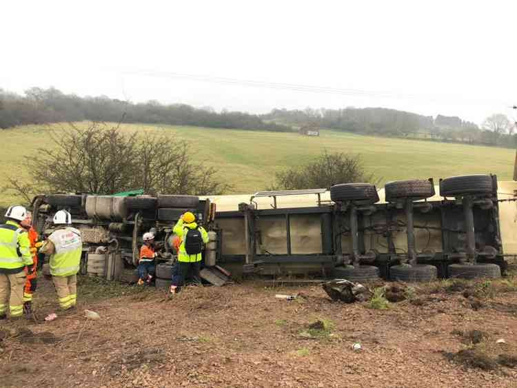 The scene at Junction 22 on Thursday morning after a collision which left a lorry on its side. Photo: Leicestershire Fire Service