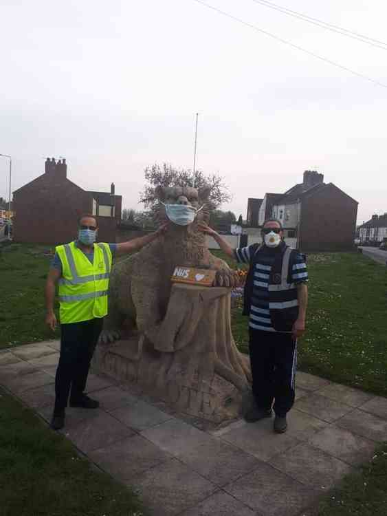 Volunteers took a moment to visit the full-masked Hugglescote Bear