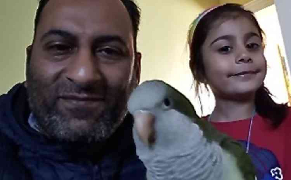 Fluffy the Parrot is back home with Shamsuddin Ziauddin, who is pictured here with his daughter Zoya in Coalville