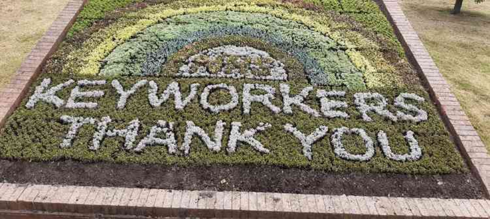 Coalville Council's flower bed message which was planted on Friday morning