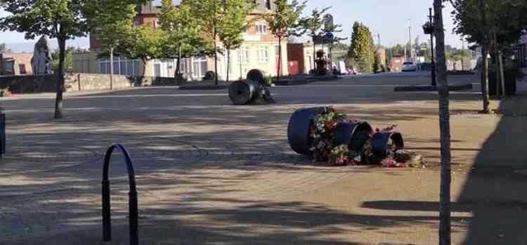 Plants and pots were overturned in Memorial Square. Photo by Terry Taylor