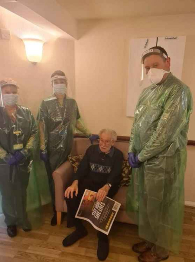 New Milton House resident Robert with Dr Goodwin, sister Worrall and Cedar Medical Centre's Operations Manager Tina.