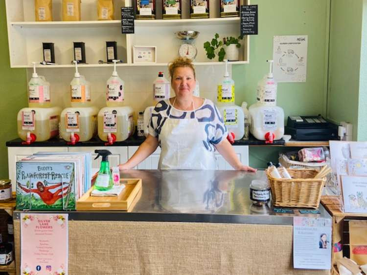 Fran behind the counter at No Frills Refills