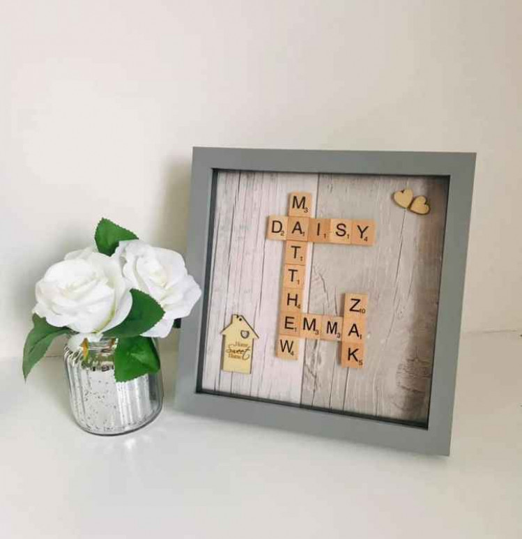 Personalised family scrabble frame.