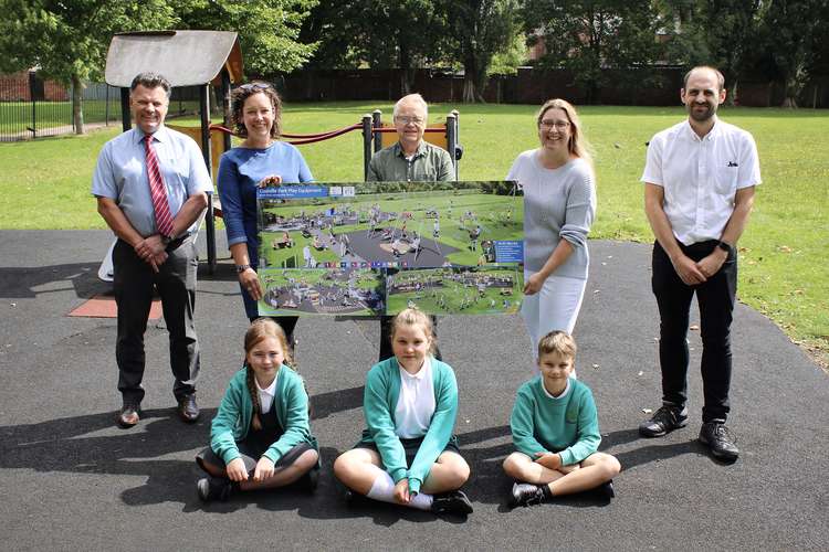 Paul Ashmore, Amy Shepherd, Cllr Legrys, Sandra Ramp and Cllr Woodman present the new plan to local schoolchildren. Photo: Friends of Coalville Park