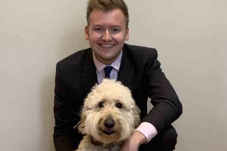 Trainee solicitor at Thatcher + Hallam, James with his lunchtime companion