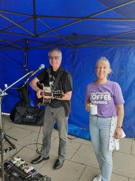 Judith with musician Ian Rendle who entertained coffee morning goers