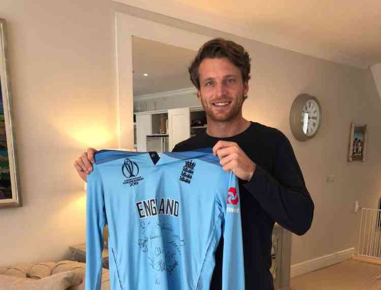 Jos Buttler with the signed shirt