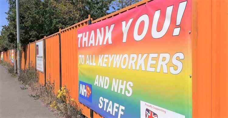 The NHS banner up at the site