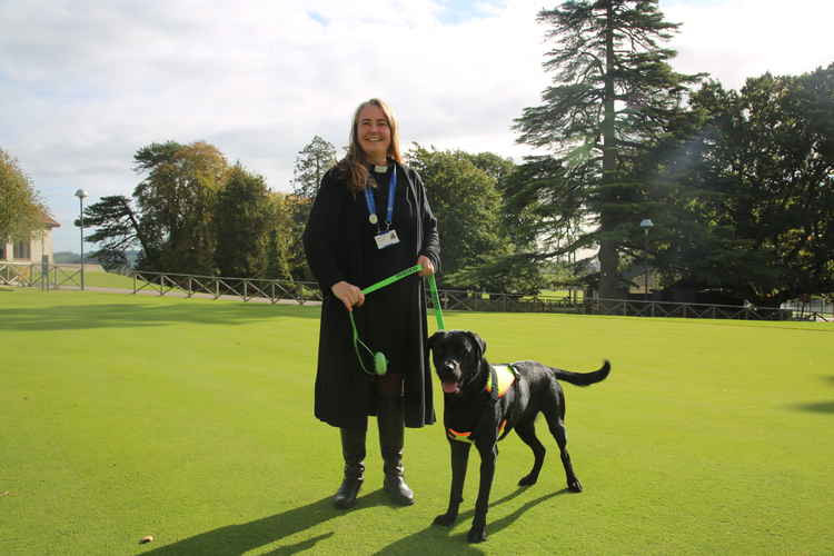 Reverend Kitto with her chaplaincy wellbeing dog Sir Nigel