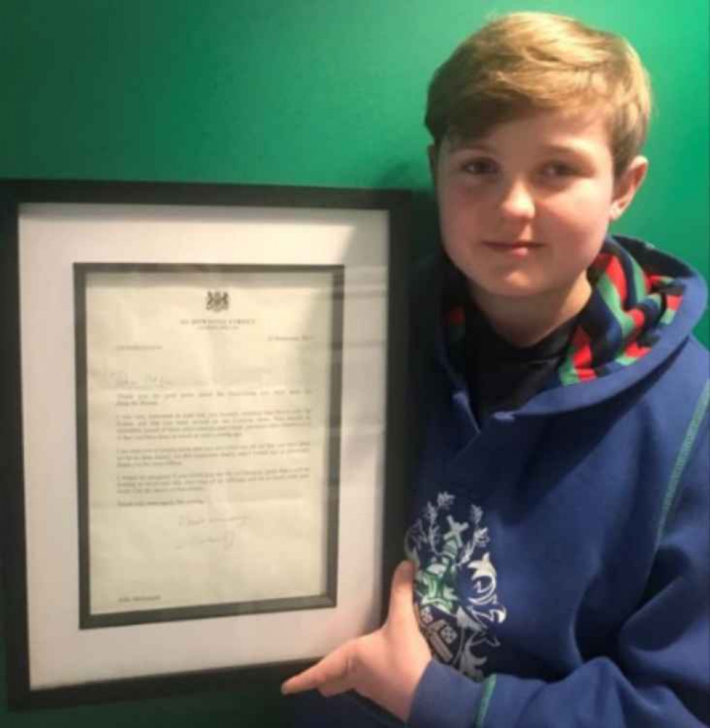 Alfie McAnespie with his letter from the Prime Minister