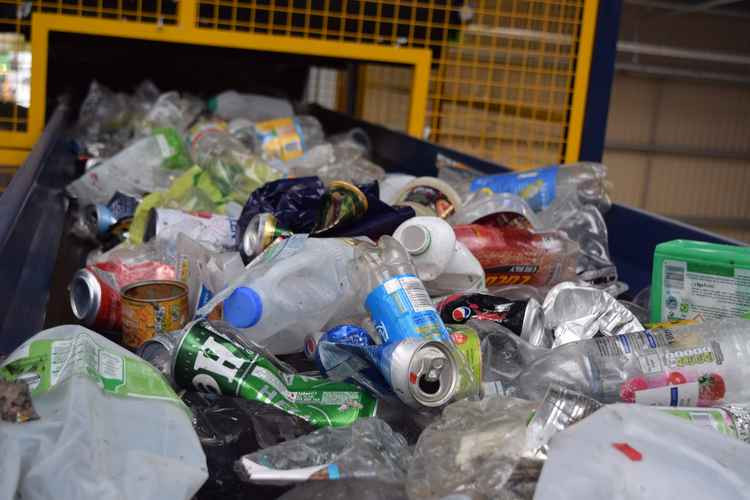 Cans and plastics at the waste depot collected during the first stage of the Recycle More rollout (Photo: Somerset Waste Partnership)