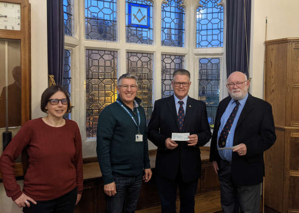 Glastonbury's St Dunstan's Lodge Worshipful Master, Tom Nutt, and Charity  Steward, Steve Defries presenting a £3000 cheque to Ian Byworth, CEO of  Citizens Advice Mendip and Session Supervisor, Suzy