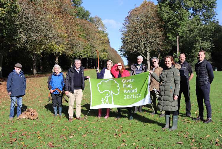 Norton Common, Letchworth, celebrating our Green Flags – Cllr Steve Jarvis with representatives from the Council, CMS, Friends of Norton Common and an avid park user and his dogs