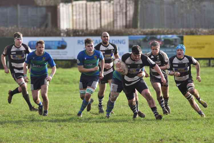Wells try to make a break. Picture by Paul Nicholls. Wells try to make a break. Picture by Paul Nicholls.