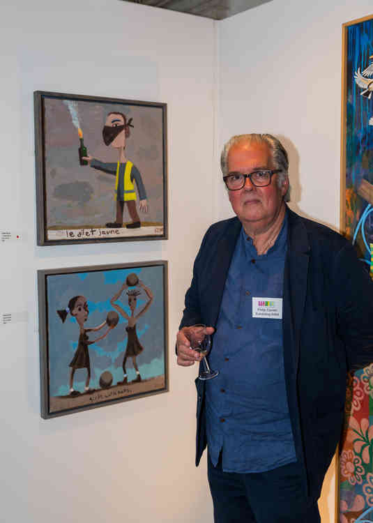 2019 Somerset artist, Philip Davies, with his two pieces of work selected for last year's exhibition at Wells Cathedral