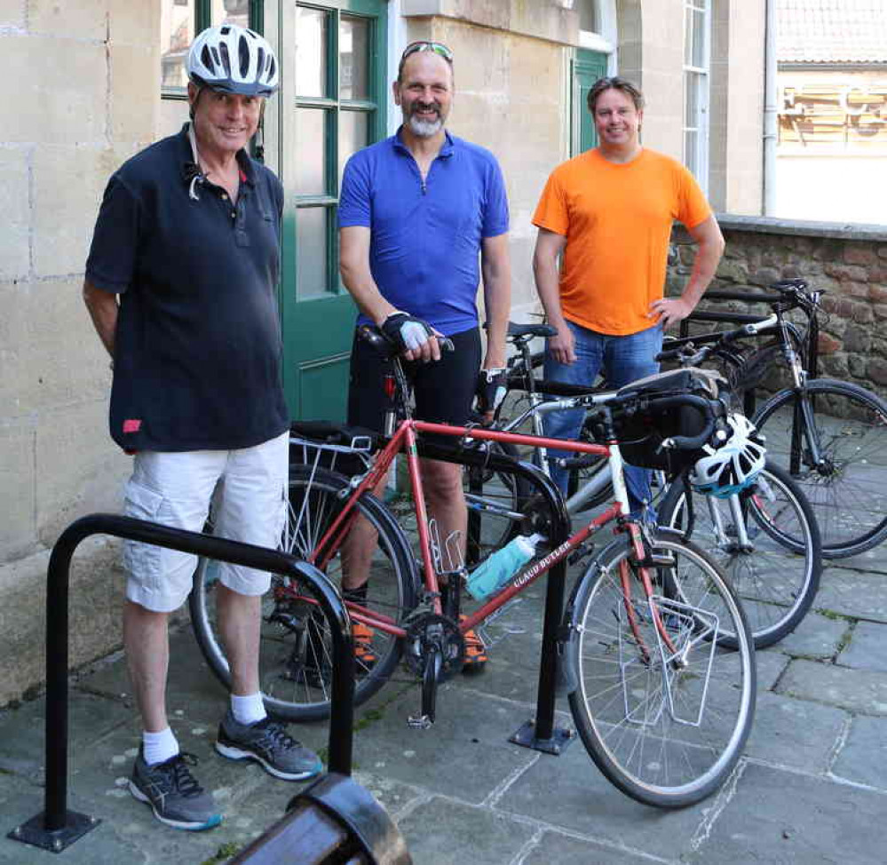 Stewart Cursley, Edric Hobbs and Matt Martin try out the new bike racks outside the town hall