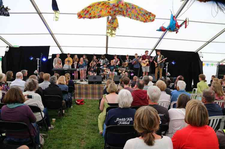 Blue School performers on the Priddy Mainstage last year (Photo: Focus on Photography Wells photo club led by Stuart Baynes, a Priddy resident)