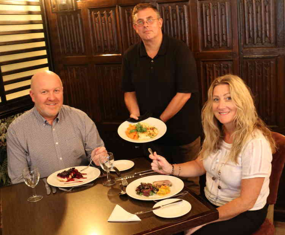 Swan Hotel manager Mark Tobin serves a Charlie Bigham's lunch to Kevin Newton and Bridget Harvey