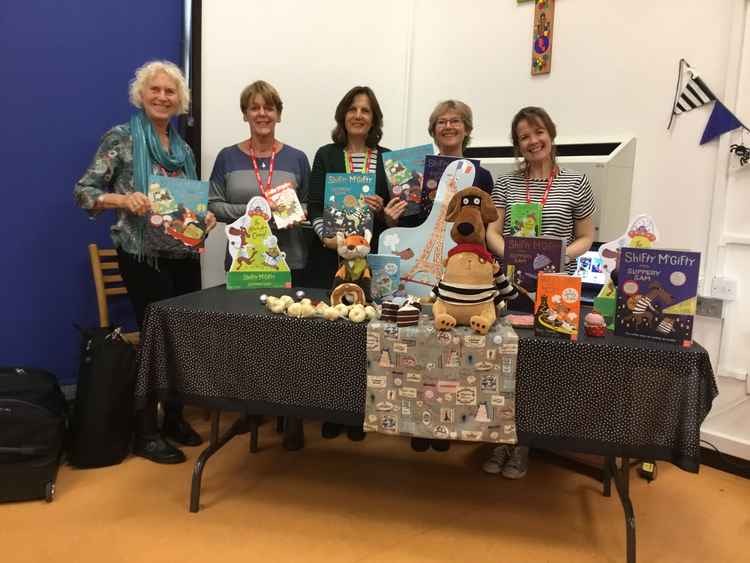 Hilary Cain (second left) with children's author Tracey Corderoy at an event for 200 pupils with members of the Festival Education Team