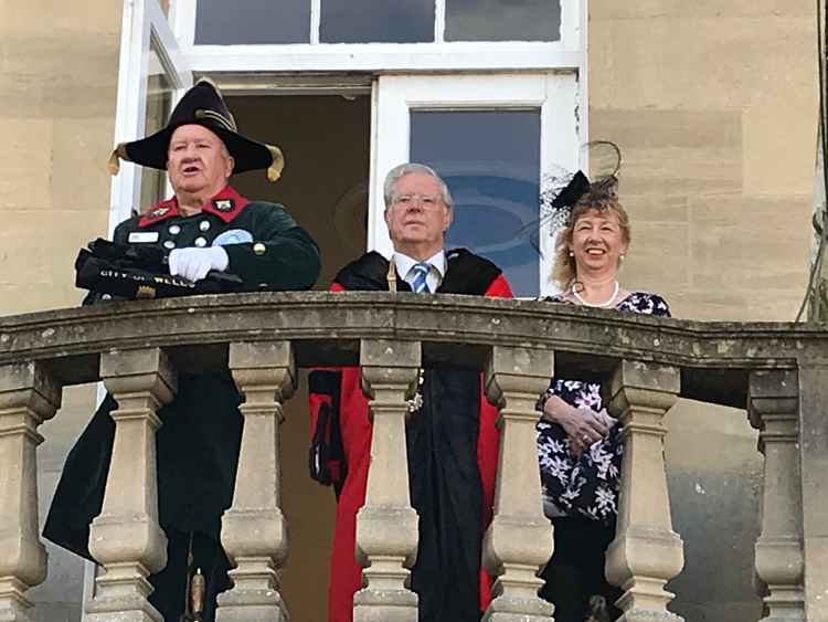 From left town crier Len Sweales, Philip and Caroline Welch as the 647th Mayor of Wells is announced