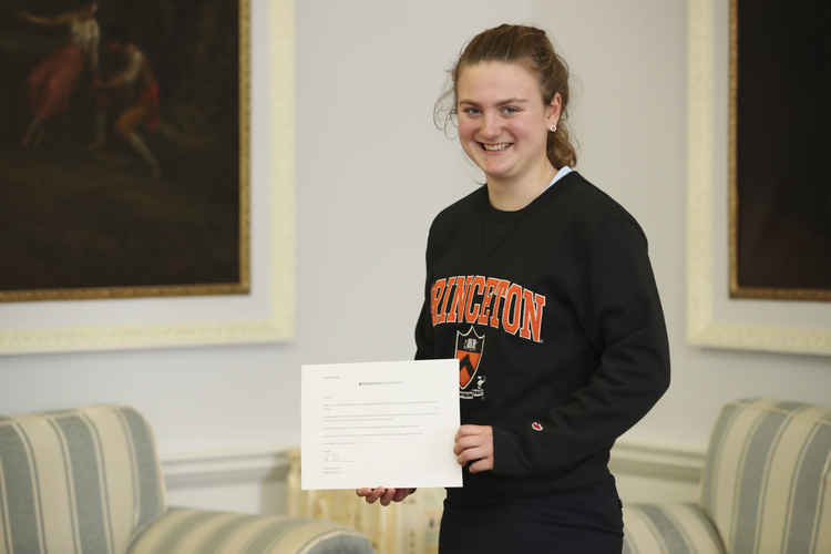 Lily with her Princeton offer certificate